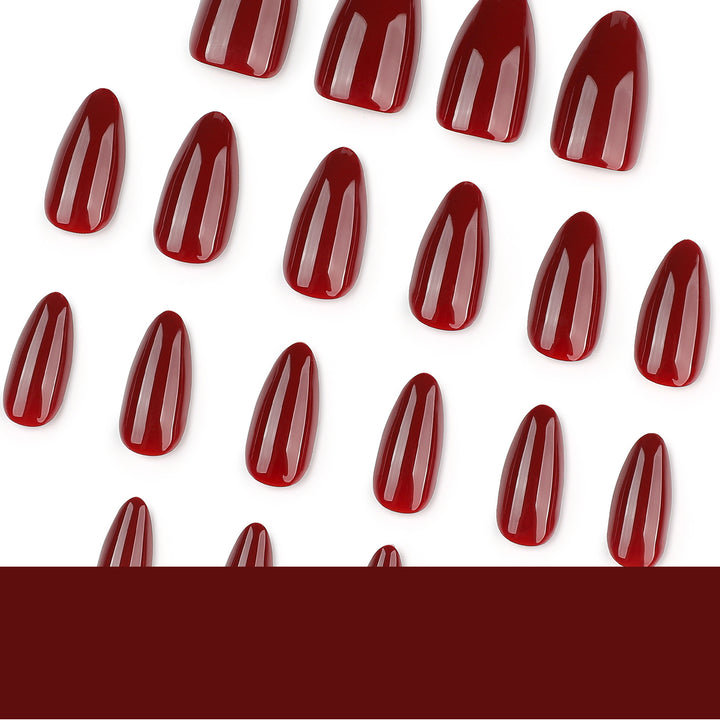 Glamorous stiletto nails with high gloss and elegant design accents Kalsten