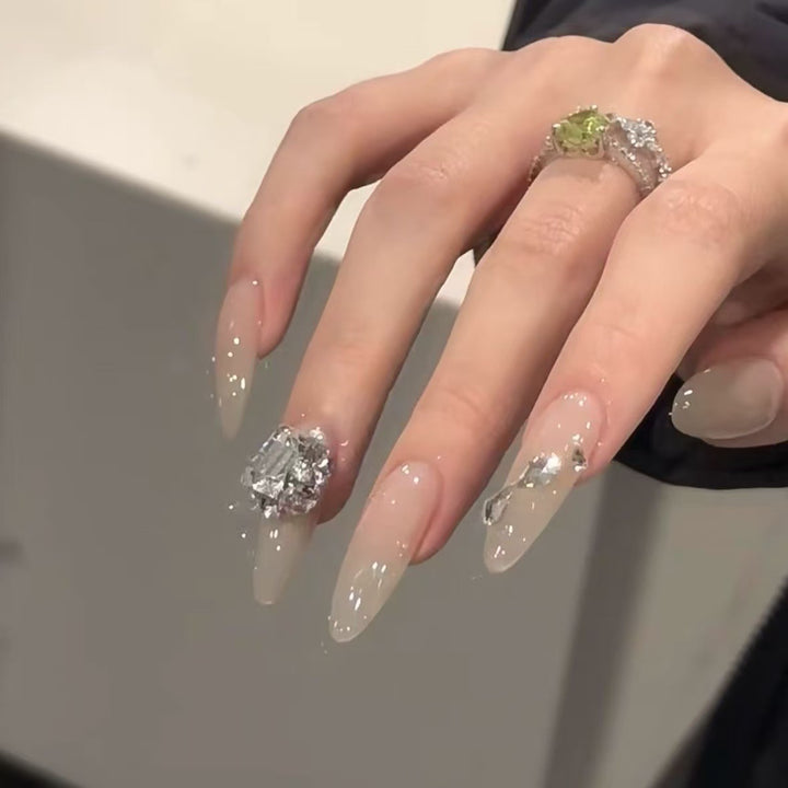 Elegant Stiletto Nail Extensions with Rhinestone Accents Kalsten