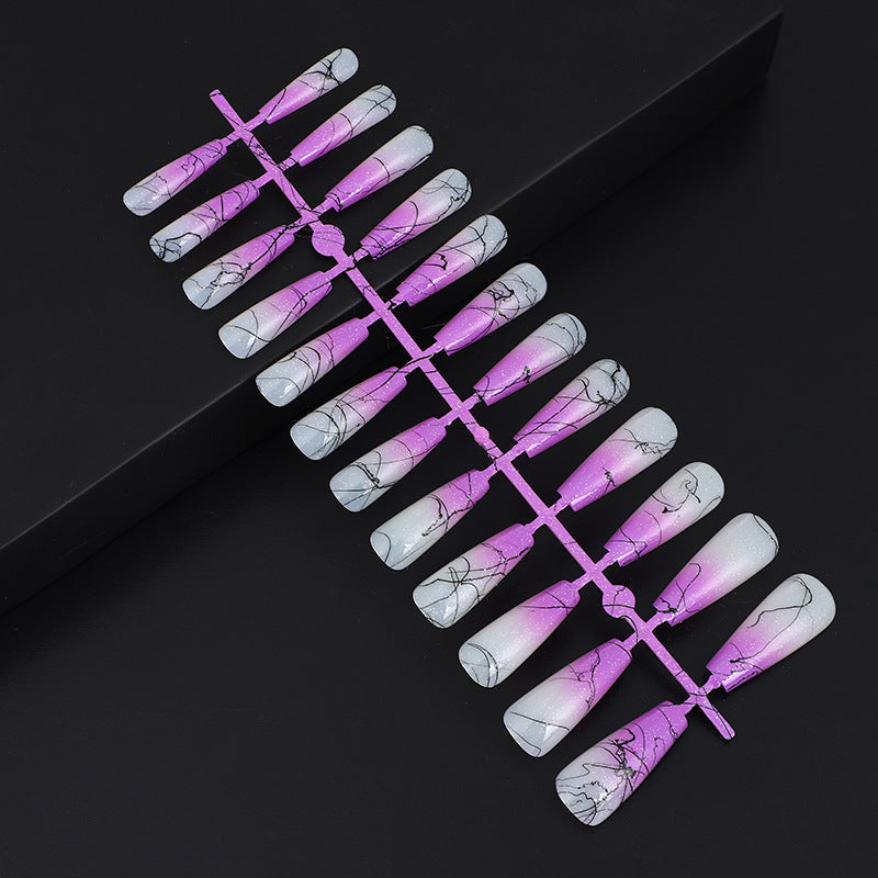 Artificial nails in modern ombre design with marbled accents Kalsten