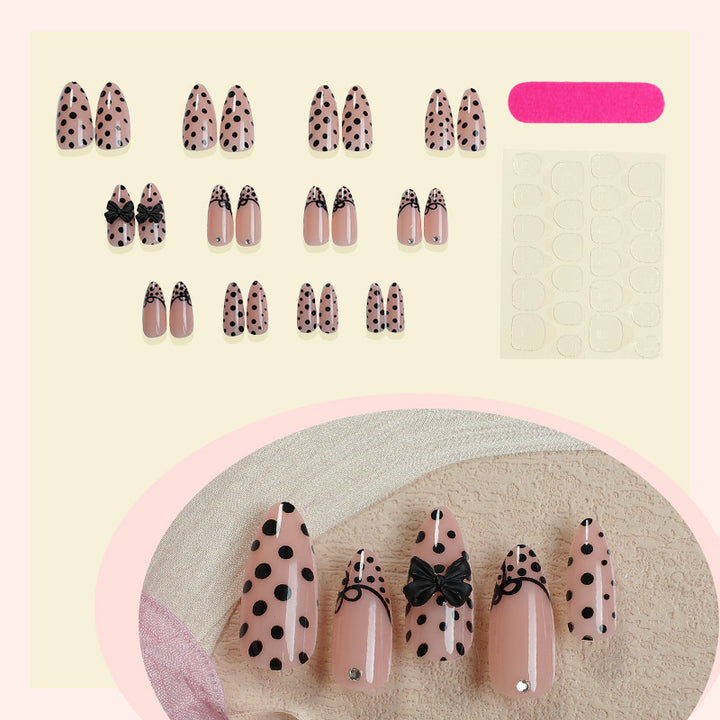 Creative nail art set with elegant dots and bow decorations Kalsten