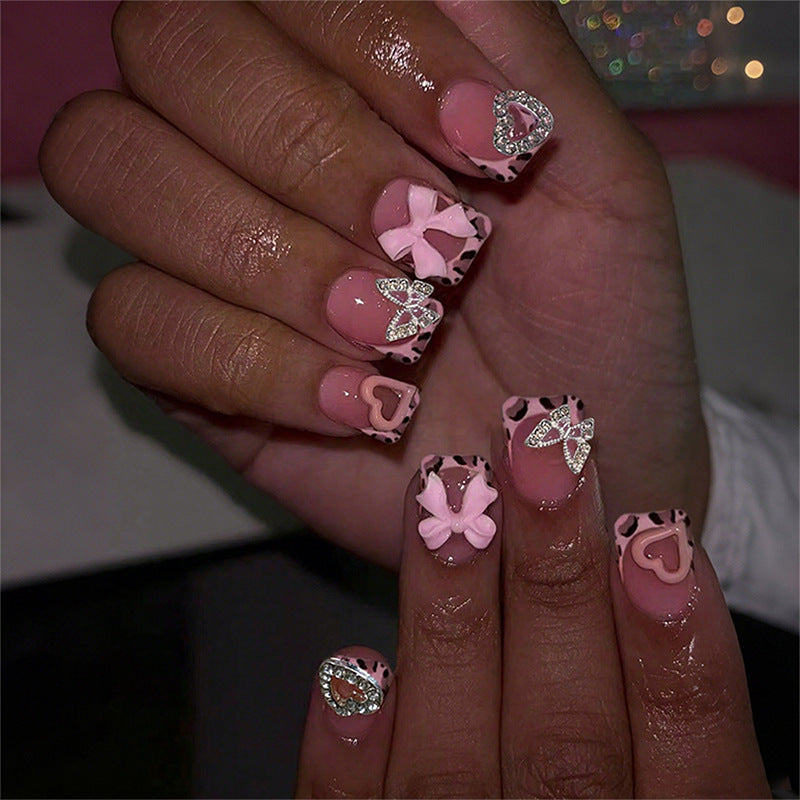 Decorative Press-On Nail Set with Artistic Bow and Heart Accents kalsten