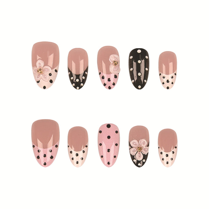 Artistic Press-On Nail Set Featuring Floral and Polka Dot Designs