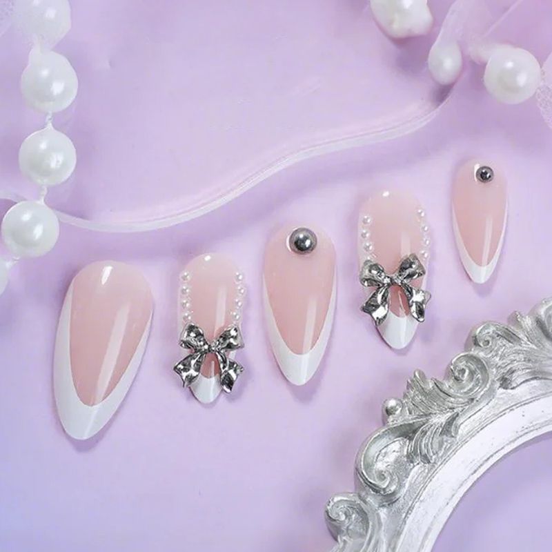Artificial nail set with elegant French tips and decoration accents Kalsten