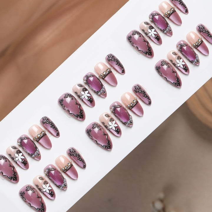 Acrylic nail set with floral design and glamorous accents Kalsten