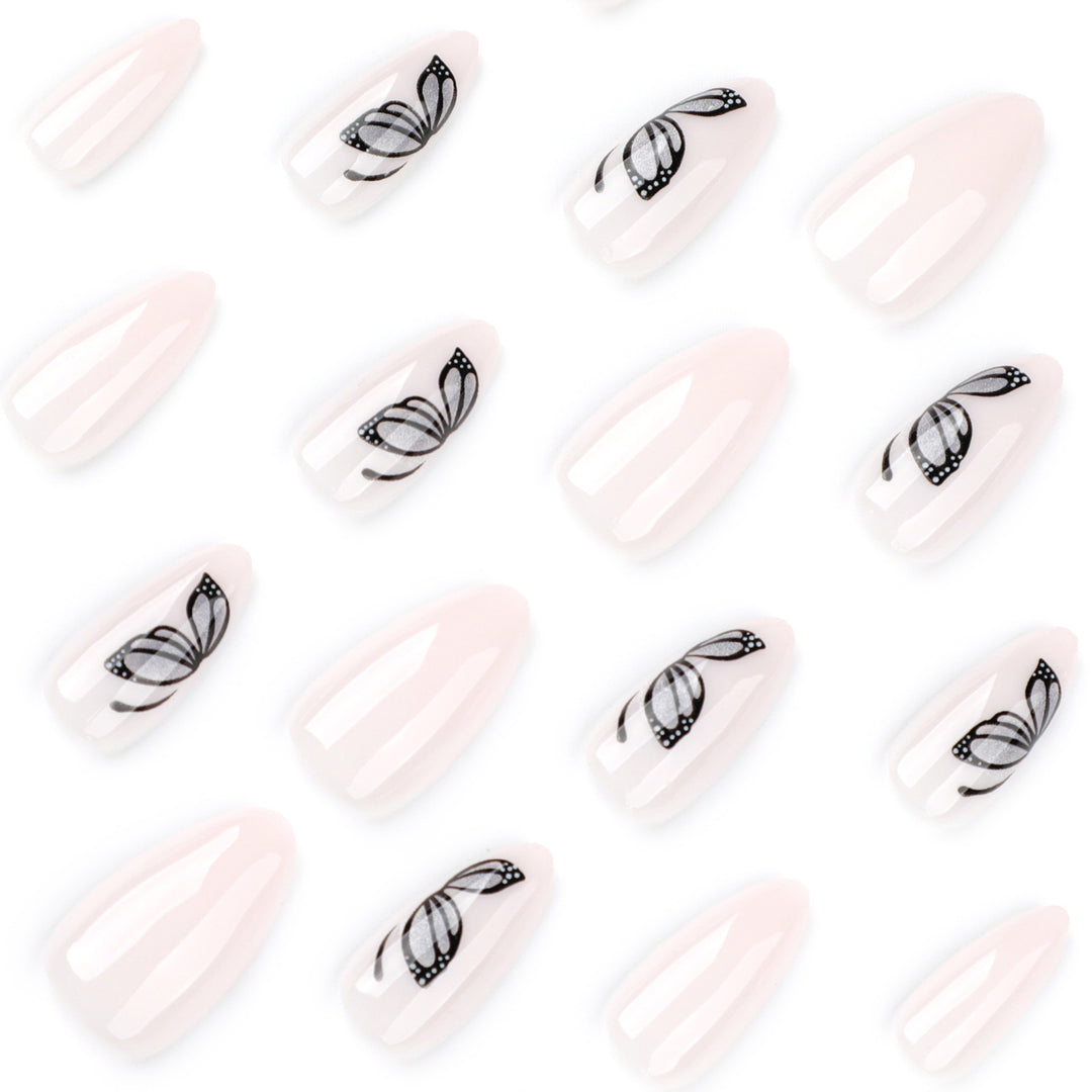 Artful nail extensions with delicate butterfly design Kalsten