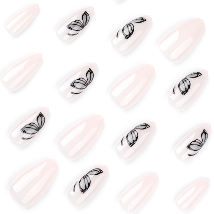 Artful nail extensions with delicate butterfly design Kalsten