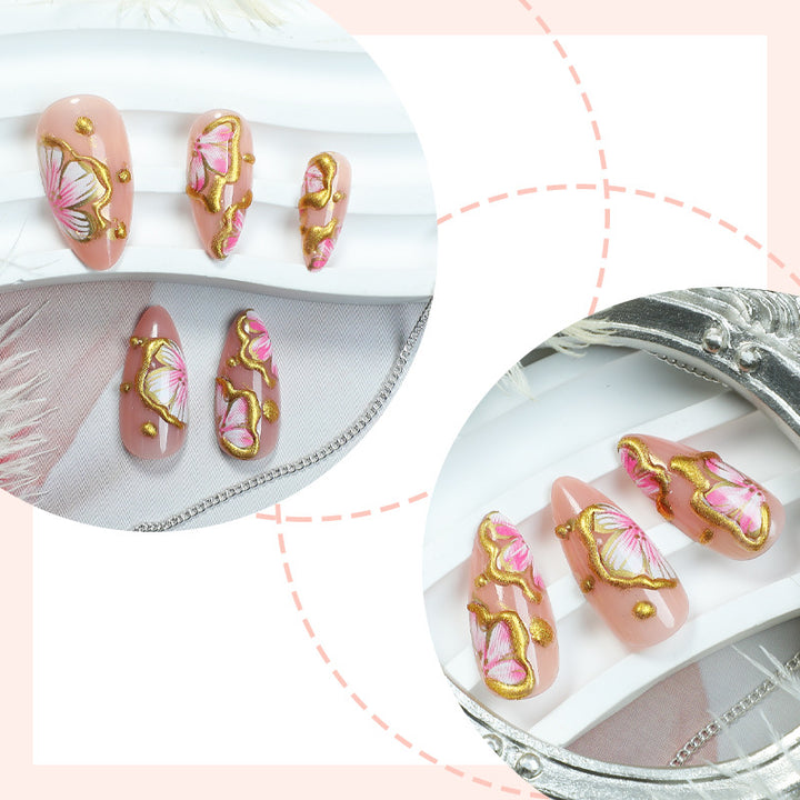 Artificial nails with graceful floral patterns and golden accents Kalsten