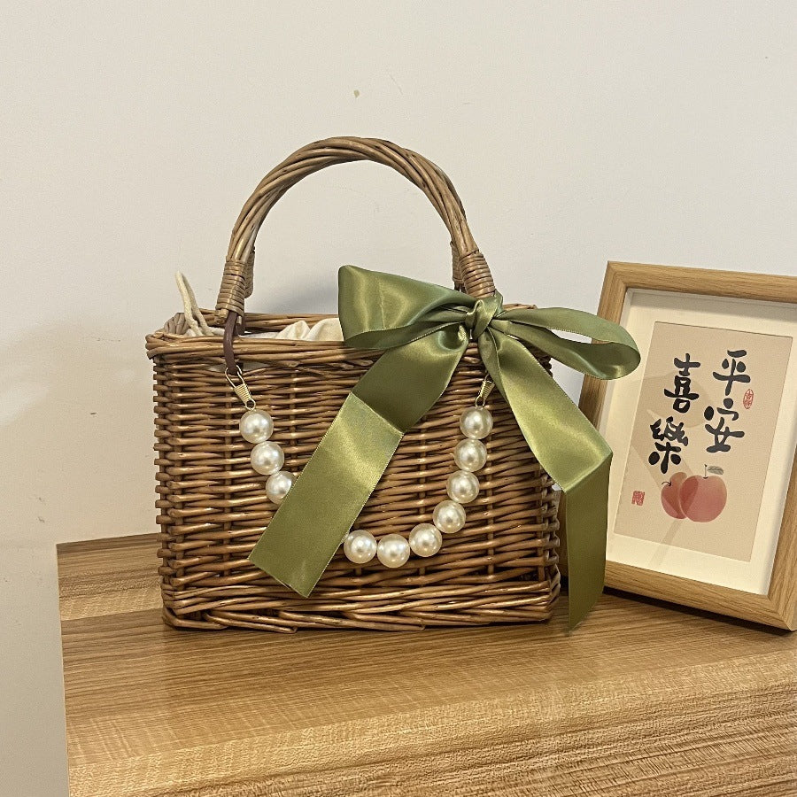 Ladies' basket bag with decorative pearl accents and bow decoration Kalsten