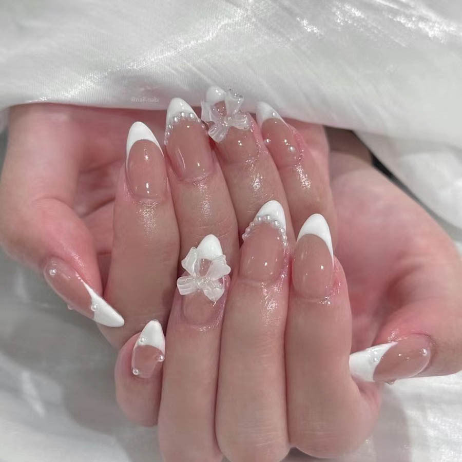 Nail art set with elegant tips and floral accents Kalsten
