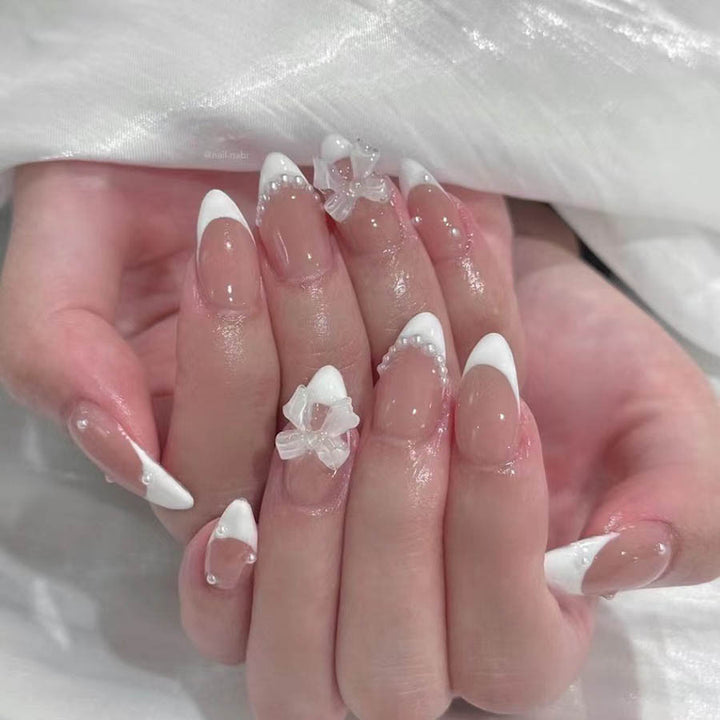 Nail art set with elegant tips and floral accents Kalsten