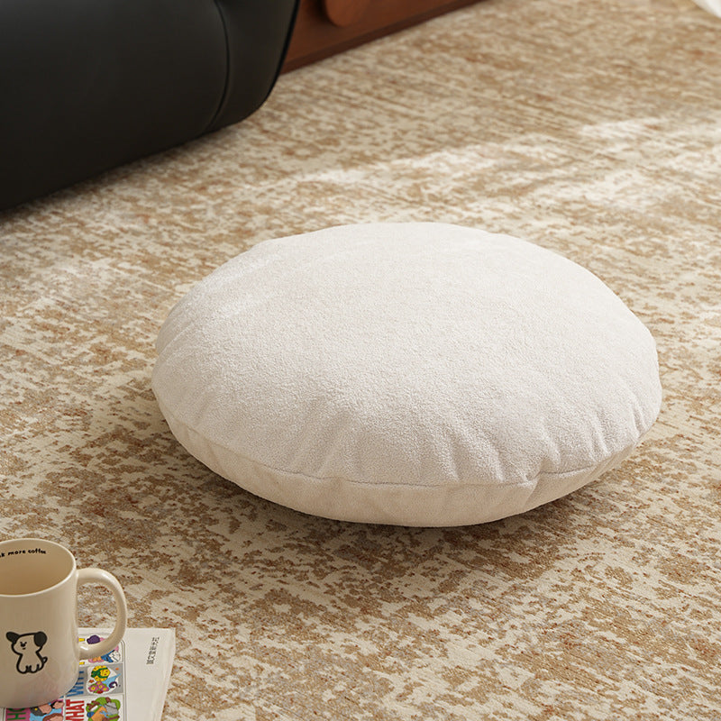 Round floor seat pouf made of teddy plush with a shape-retaining padded core Kalsten