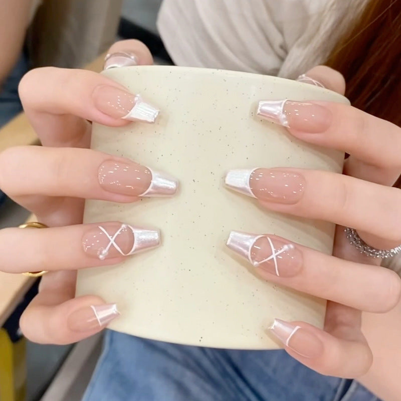 Glamorous artificial nails with heart design and glittering accents Kalsten