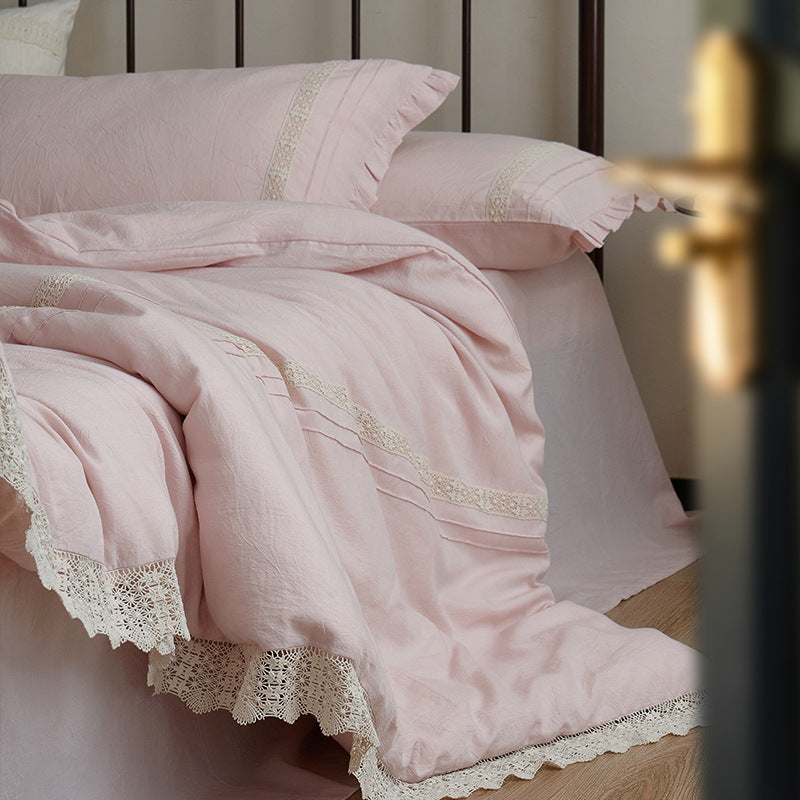 High-quality linen bedding set with handcrafted crochet lace, box pleats, and integrated bed skirt