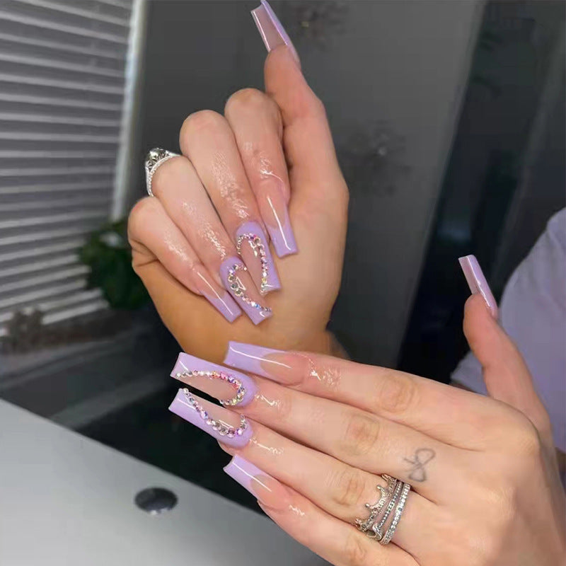 Nail art set with sparkling hearts and elegant glitter accents Kalsten
