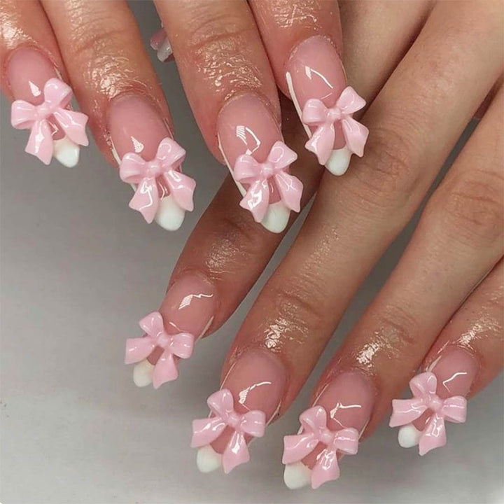 Nail art set with playful bow accents Kalsten