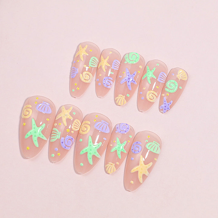 Artistic Press-On Nail Design with Ocean-Inspired Accents Kalsten