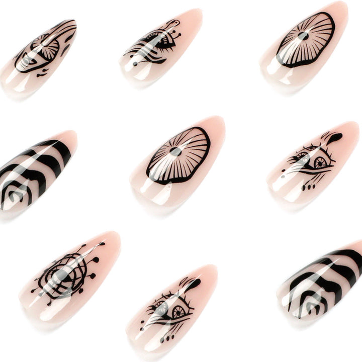 Artistic acrylic nails in elegant stiletto design with graphic patterns Kalsten