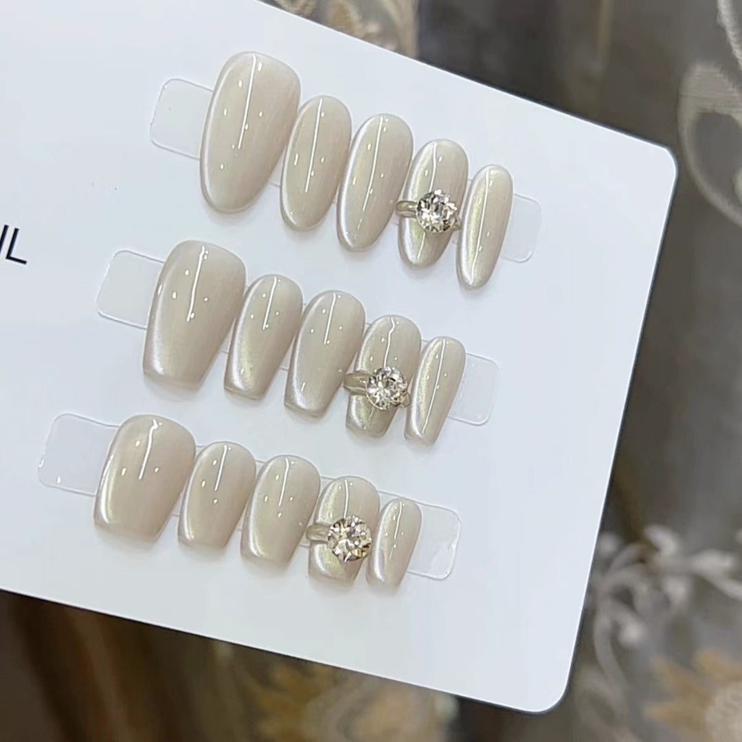 Elegant Press-On Nail Art with Jewel Accents Kalsten