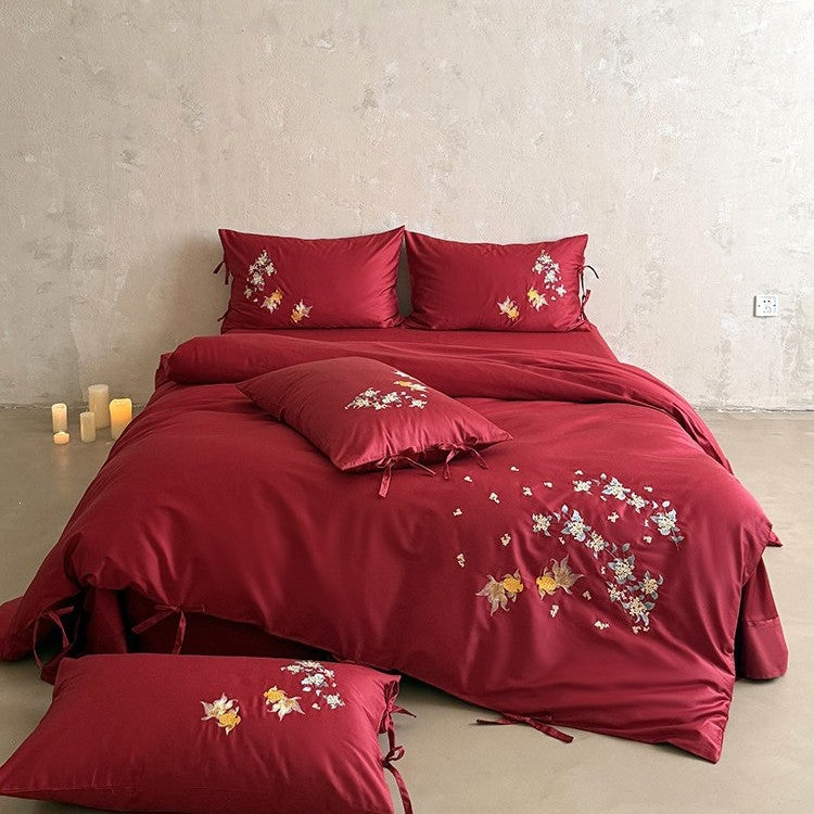 Luxurious satin bedding set with intricate floral-fish embroidery