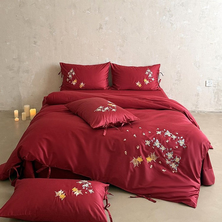 Luxurious satin bedding set with intricate floral-fish embroidery