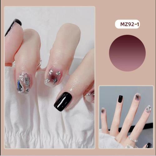 Elegant nail design with bow and rhinestone details Kalsten