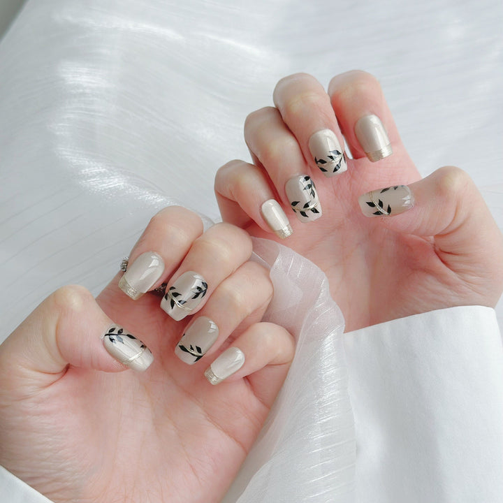 Artistic Press-On Nail Set with Floral Accents