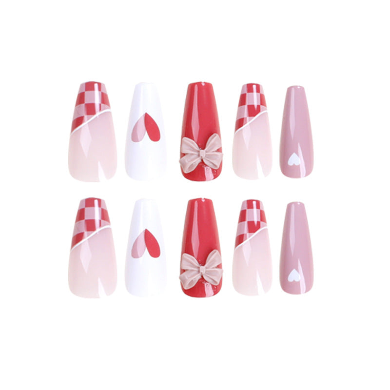 Artful nail extensions with playful designs and romantic accents Kalsten
