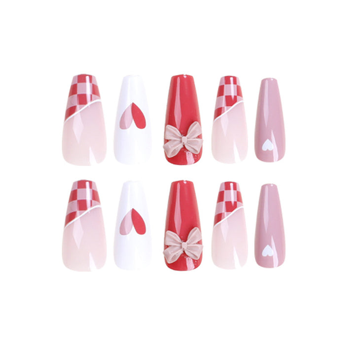Artful nail extensions with playful designs and romantic accents Kalsten