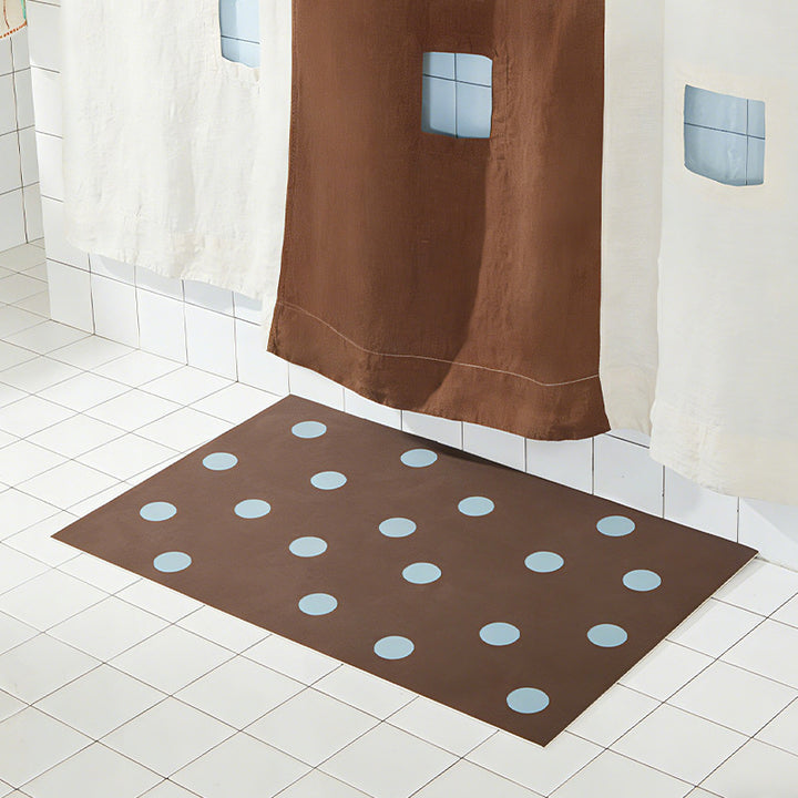 Wipeable placemat made of PVC with large polka dot pattern and non-slip backing Kalsten