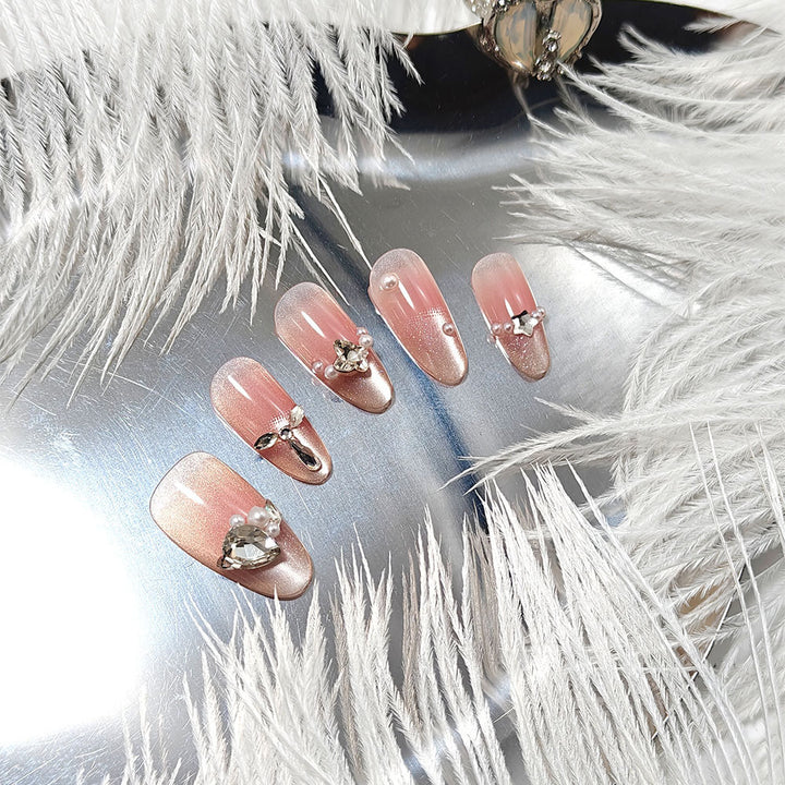 Glamorous artificial nail set with elegant rhinestone applications Kalsten