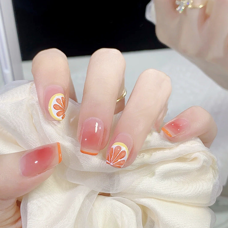 Glamorous artificial nails with delicate flower and glitter effects Kalsten
