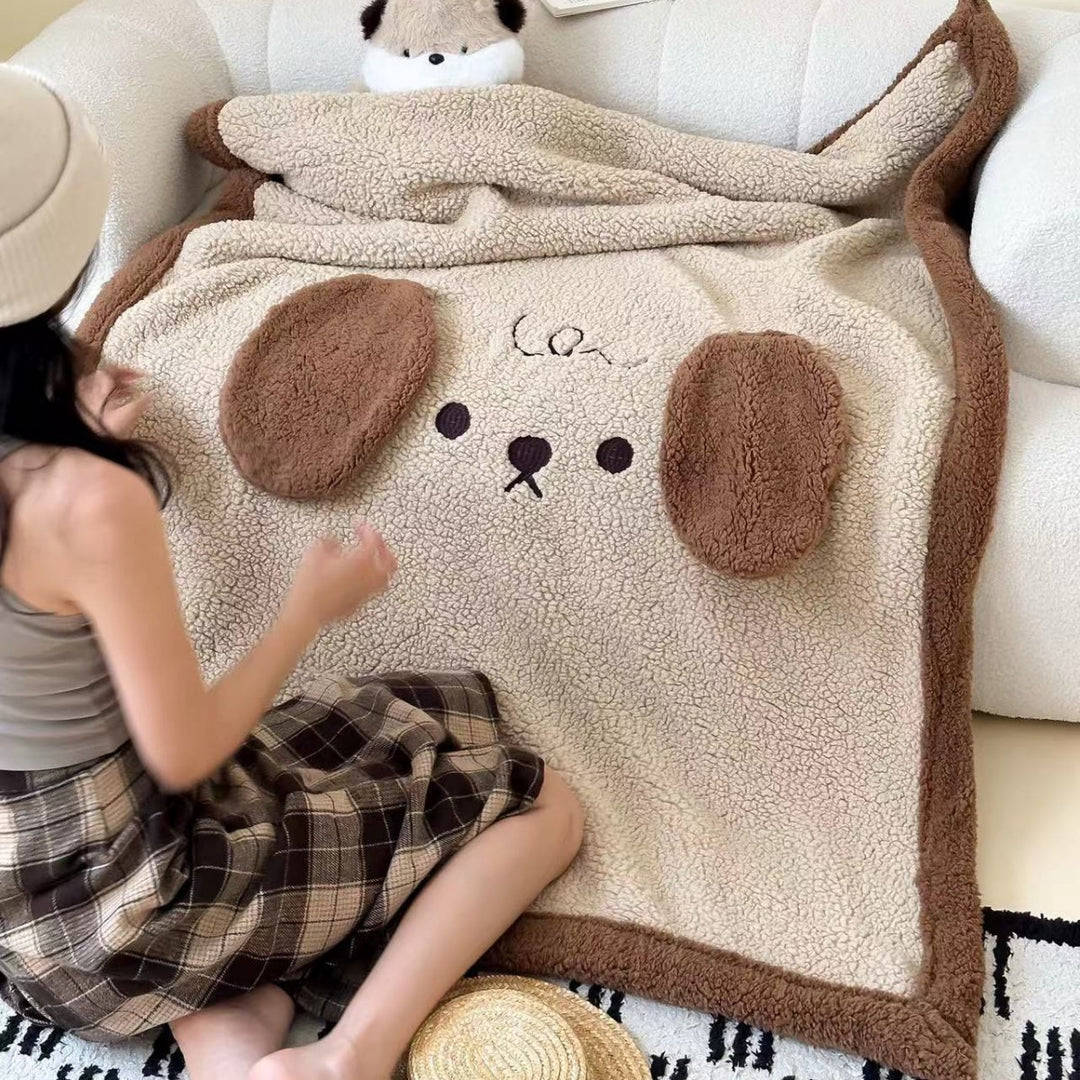 Cuddly Sherpa children's blanket with appliquéd cloud motif and teddy lining