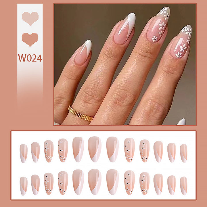 Artistic Nail Tips with Floral Accents Kalsten