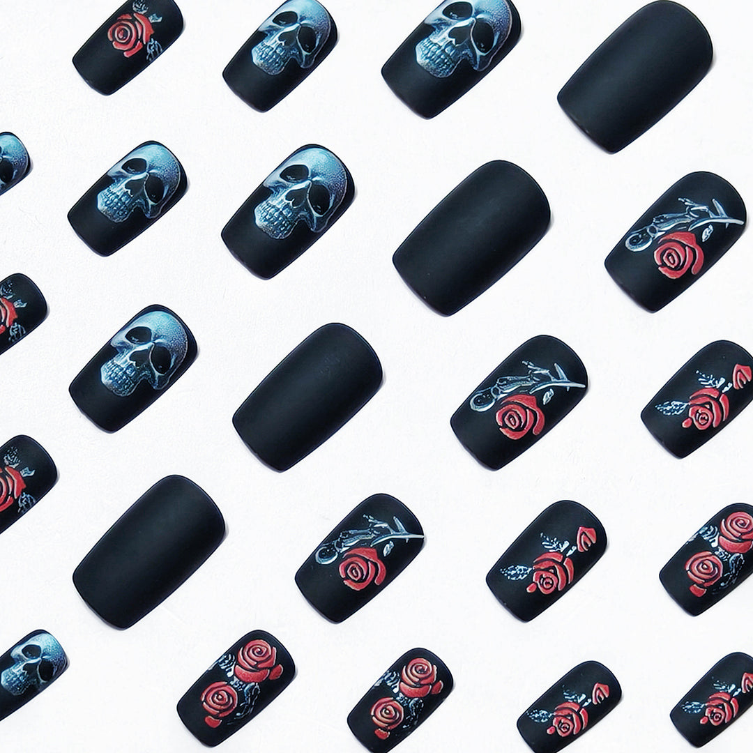 Creative nail art with skull and rose designs Kalsten