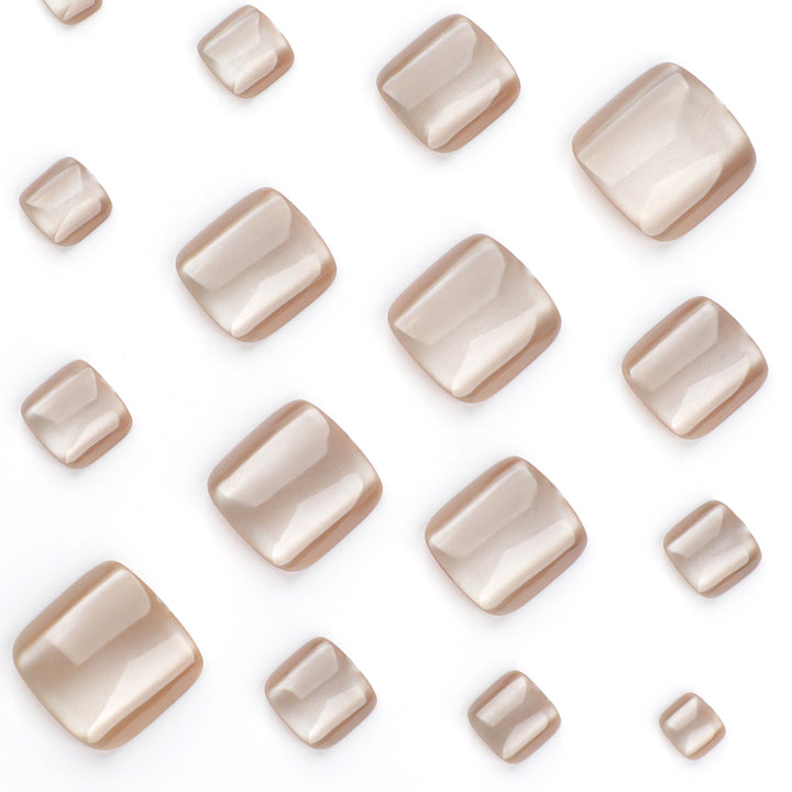 Artful toenail design with glossy accents Kalsten