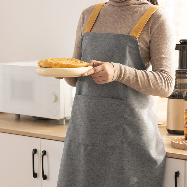 Adjustable canvas apron with wide contrast straps and applied front pocket Kalsten