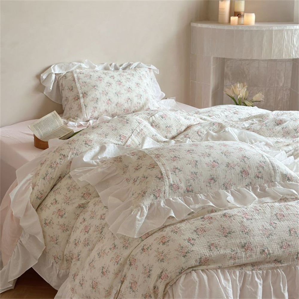 Romantic bedding set made of cotton-linen with delicate ruffles and floral pattern