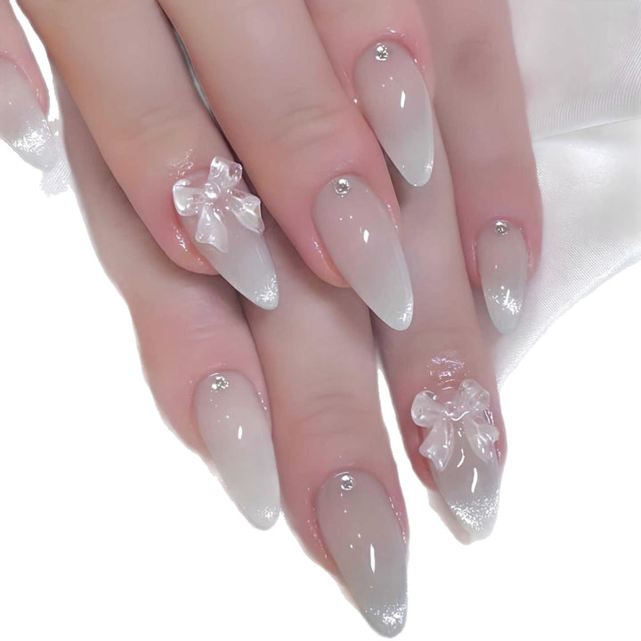 Elegant Stiletto-Shaped Press-On Nails with Decorative Bow Accents Kalsten