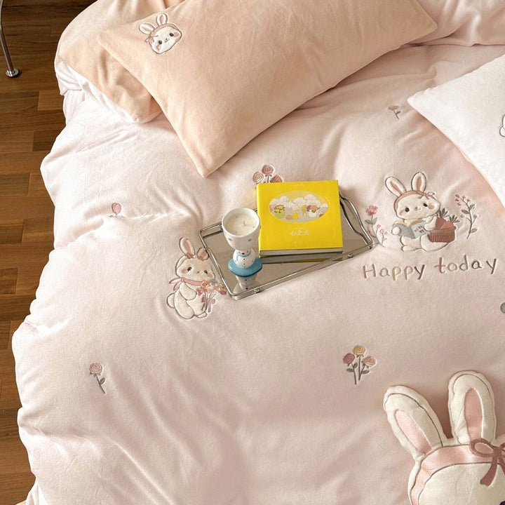 Cute children's bedding set made of soft cotton terry with embroidered cat appliqués and cuddly plush pillow.