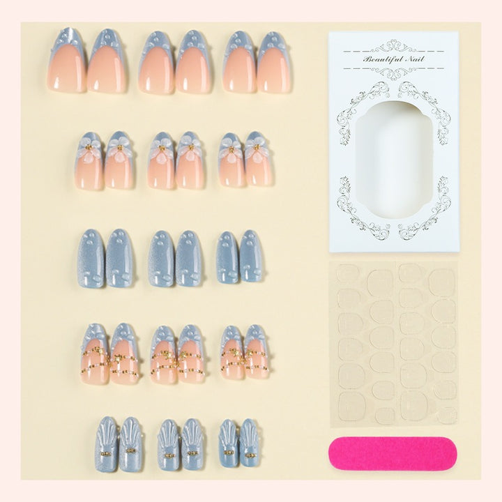 Creative acrylic nail set with elegant flower and glitter accents Kalsten
