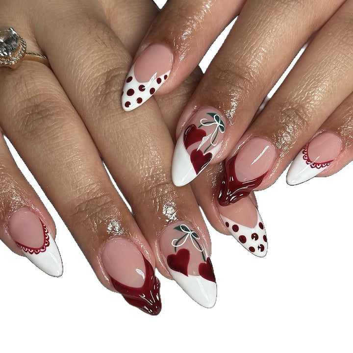 Creative nail art set with romantic heart design and playful accents Kalsten