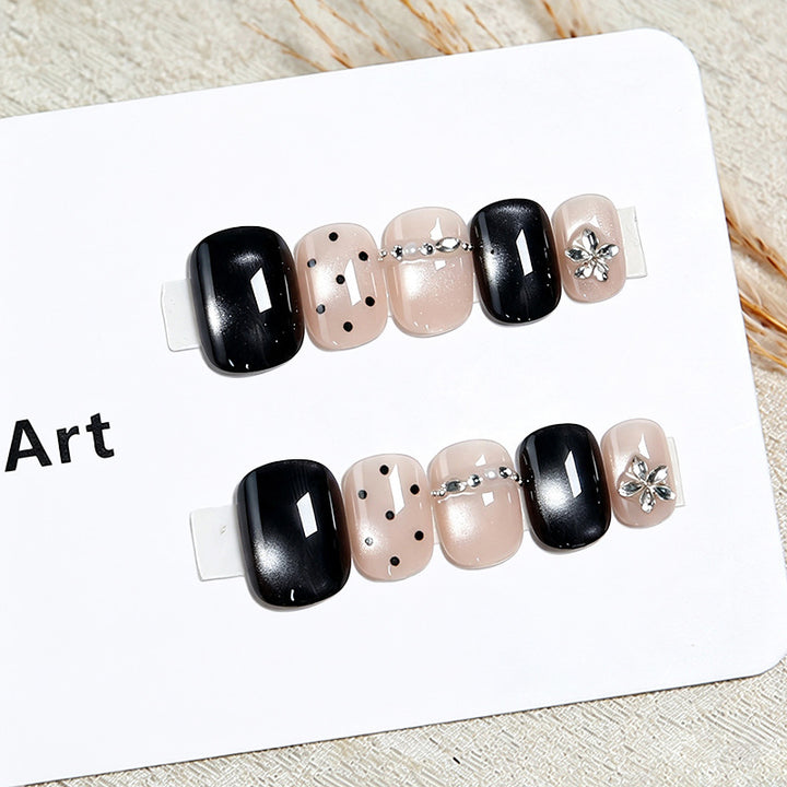 Acrylic nail set with glamorous accents and delicate designs Kalsten