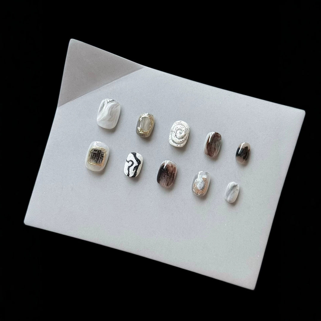 Artistic Press-On Nail Set with Modern Marble and Metallic Accents
