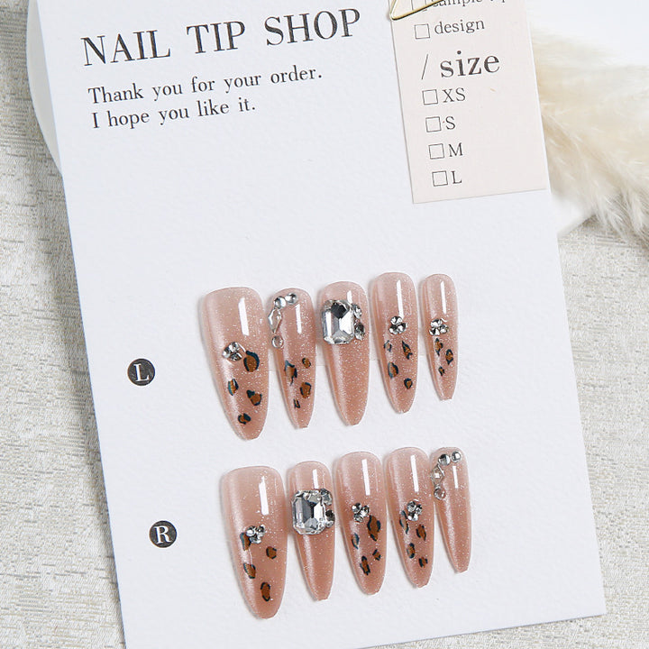 Glamorous artificial nail set with fun leopard pattern and glittering accents Kalsten