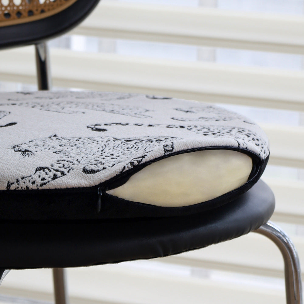 Round seat cushion with decorative animal print and non-slip underside Kalsten