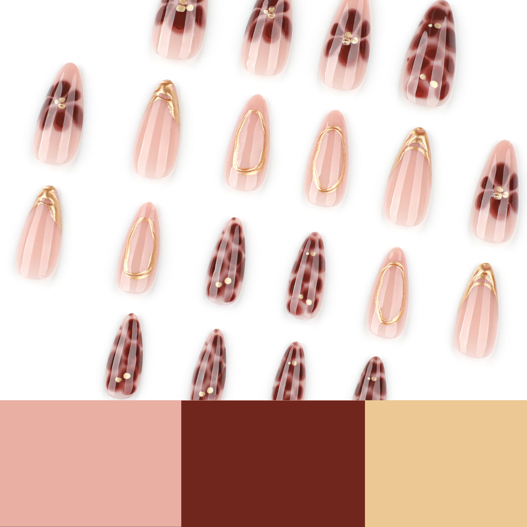 Elegant artificial nails with floral accents and gold details Kalsten