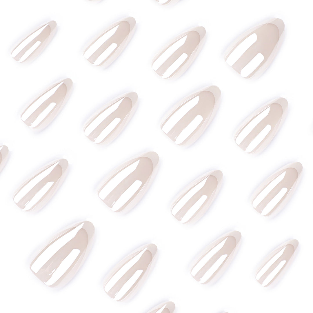 Artistic stiletto nails with elegant French tip embellishments Kalsten
