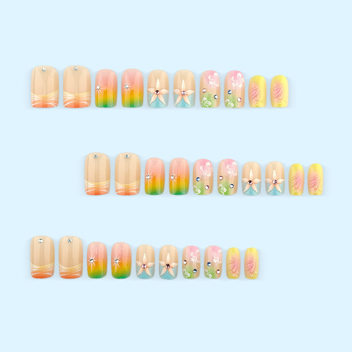 Artificial nails in vibrant floral design with glitter accents Kalsten