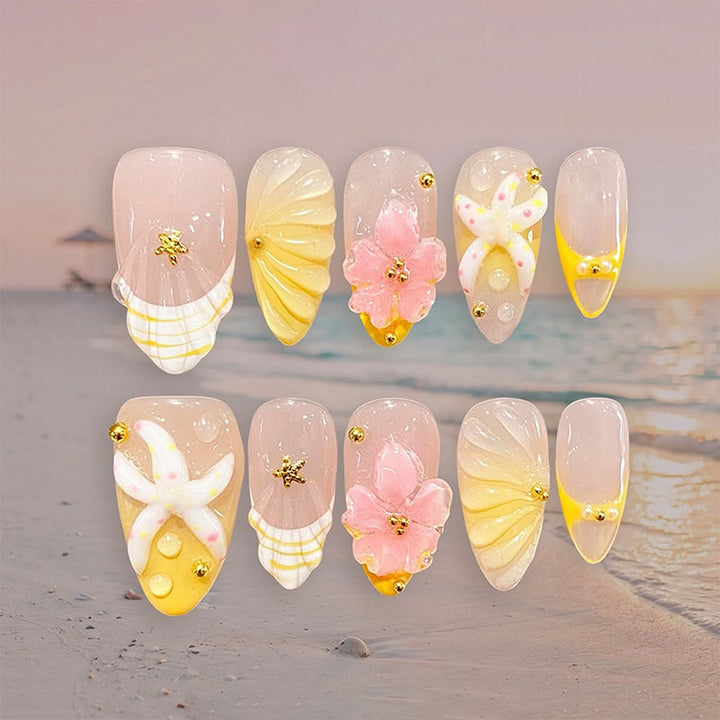 Artificial nail set with glamorous floral designs and creative glitter accents Kalsten