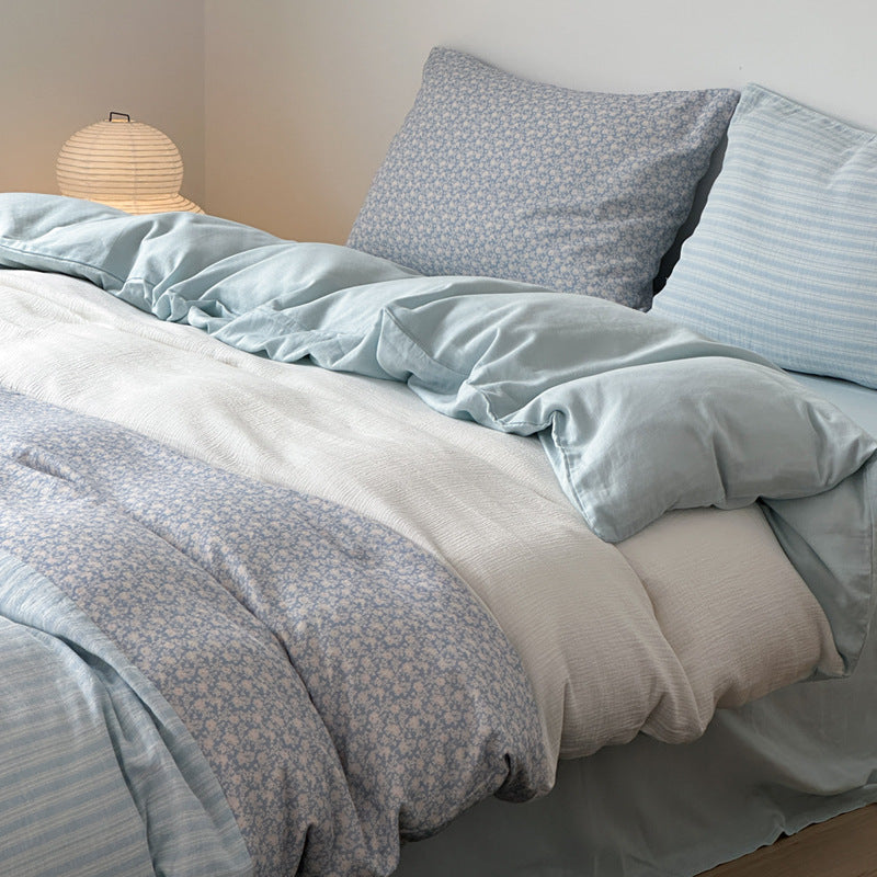 Luxurious cotton satin bedding set with striped and floral patchwork